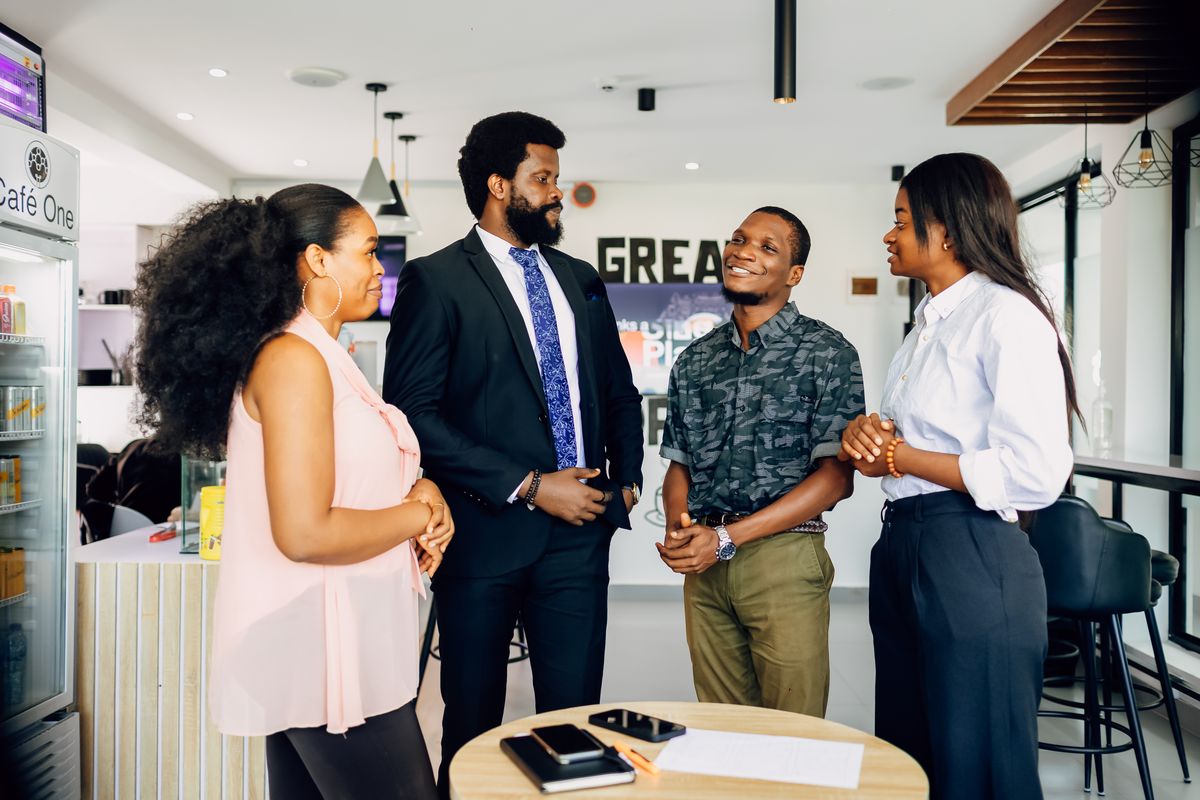 Group of professionals having a casual meeting in an office setting in Lagos