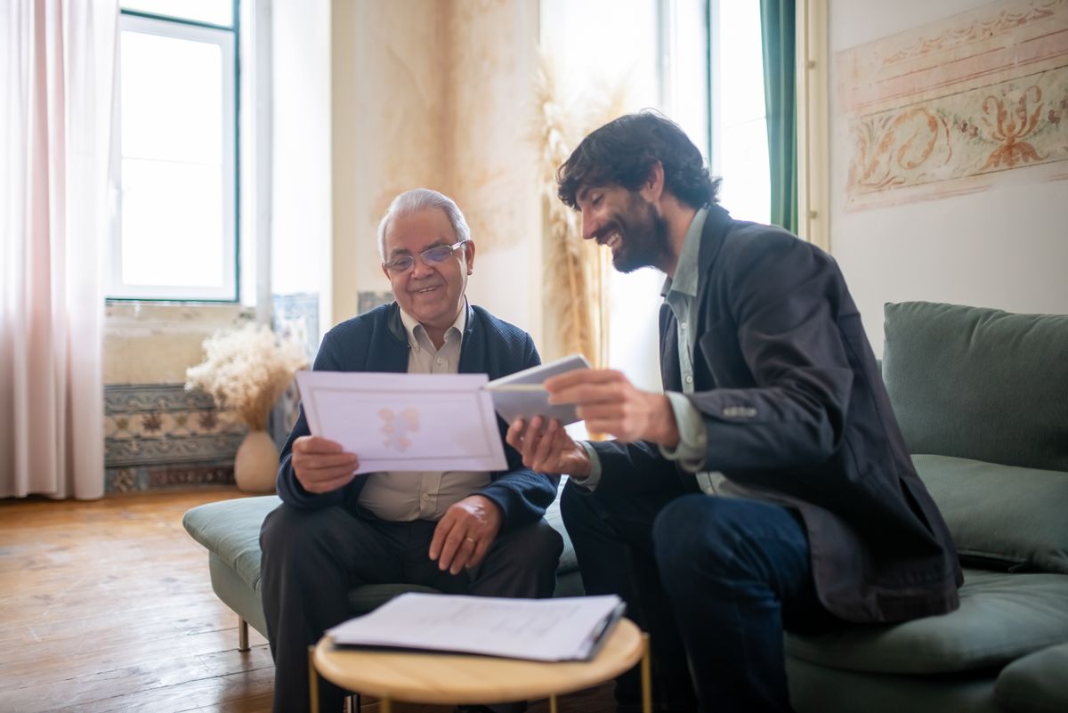 An elderly man and a younger man